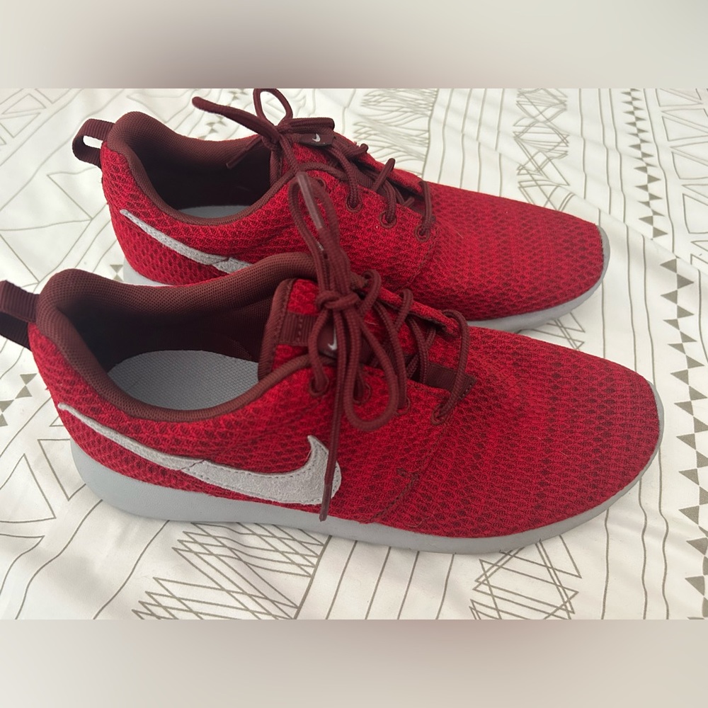 Red Nikes with grey size 8